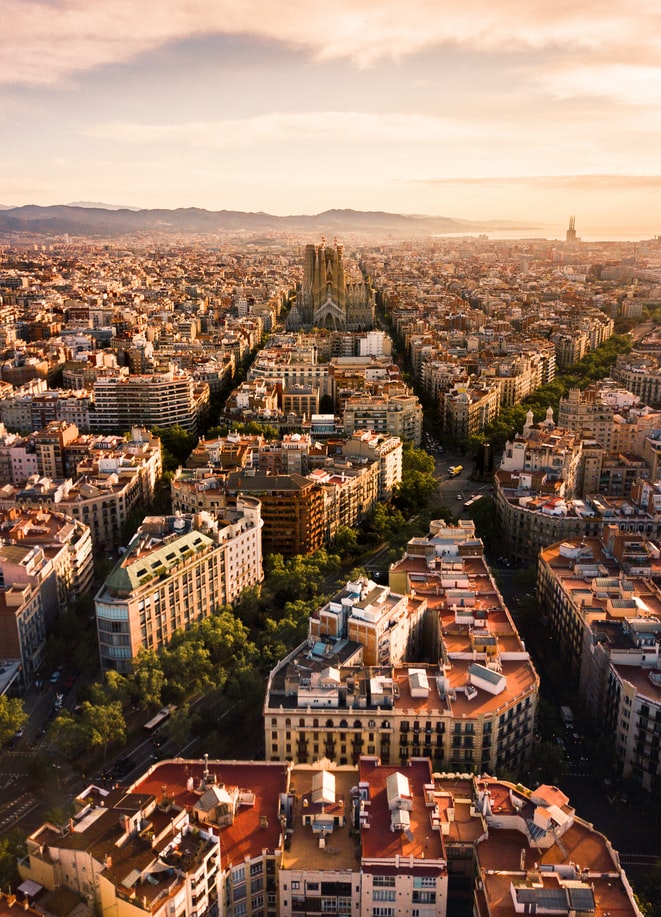 view over the city of barcelona in spain during sunset