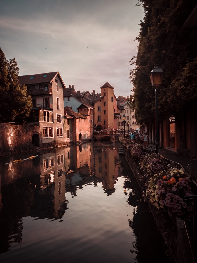 annecy in france, postcard villages, fairy tale villages in the world, view from the river to houses in annecy