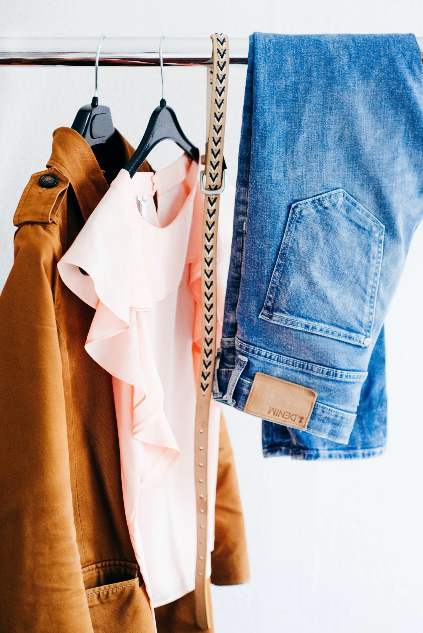 creating new outfits with vintage cothes, brown jacket, white shirt, gold belt and blue jeans