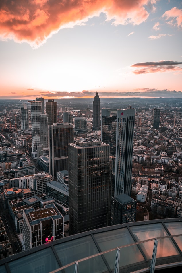 a view over new york city during sunset